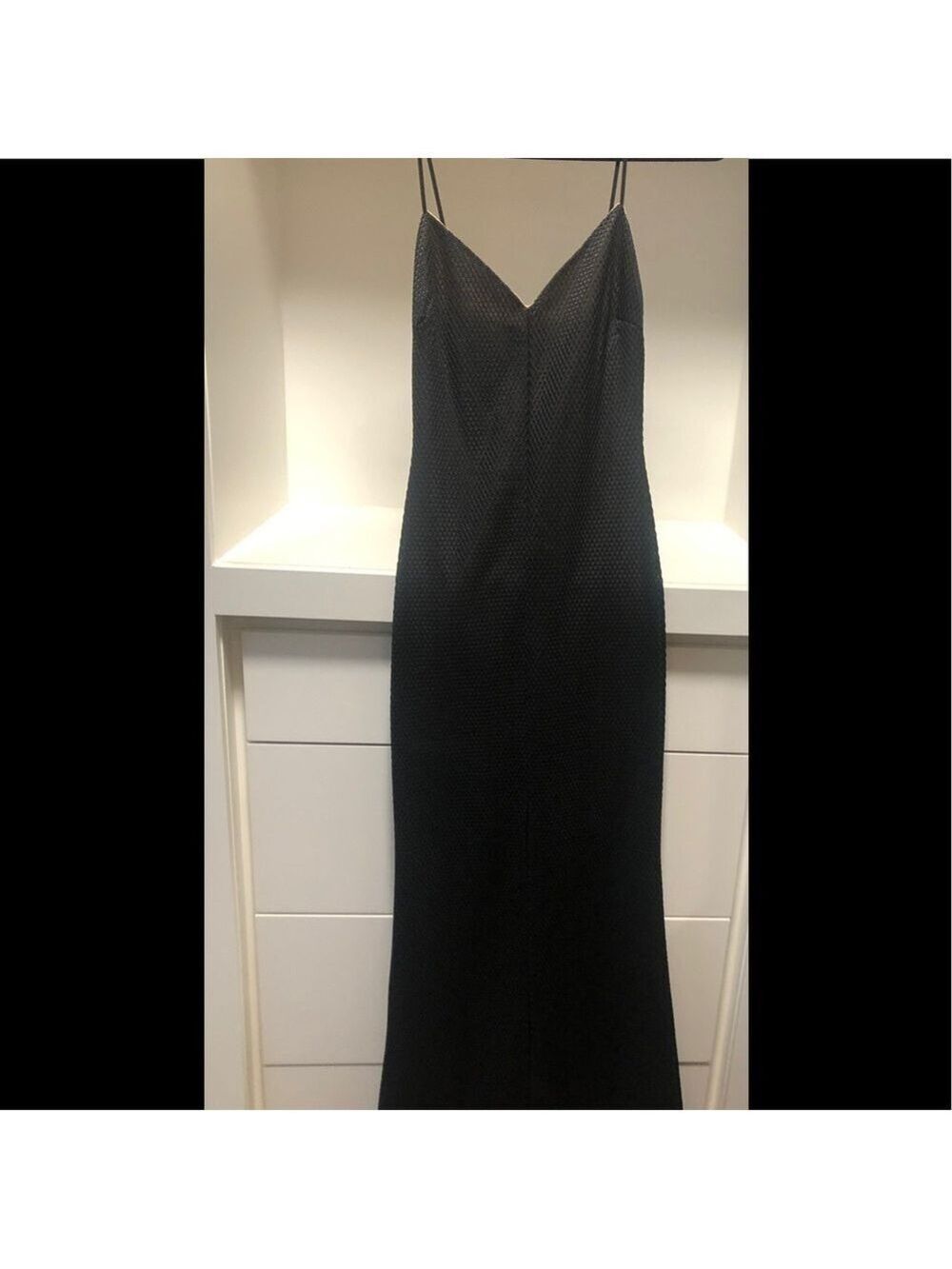 La petit garçon black gown